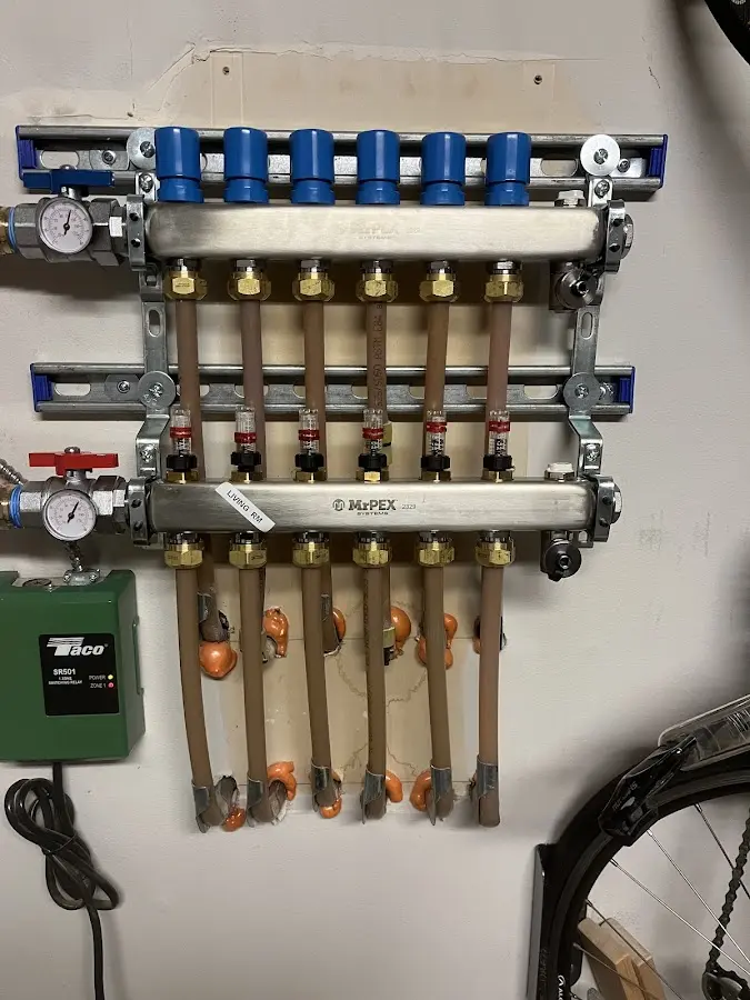 Plumber performing Water Heater Repair at a residential property in Bogota